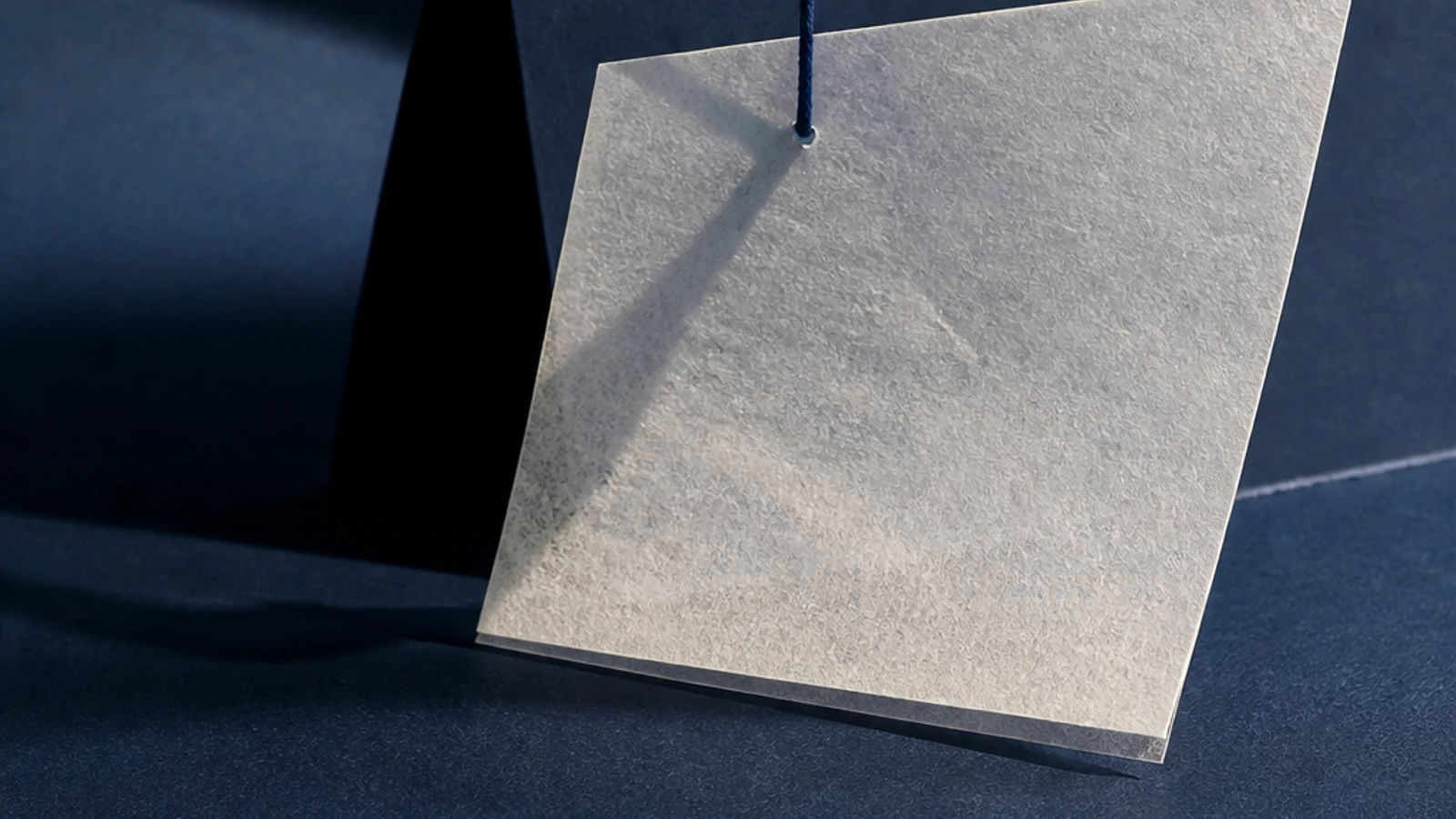 An indigo campaign brief connects an advertiser, creator, post, and disclosure marker on a pale paper grid.